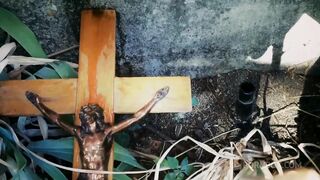 italian slut pisses on a crucifix in a deconsecrated cemetery
