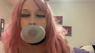 bubble blowing teen shows off body