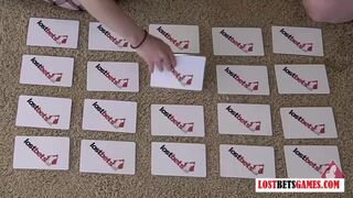 Two Girls play a strip game of match the cards