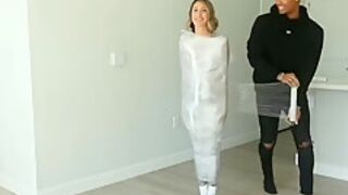 Gym Girl Mummified In Saran Wrap