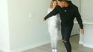 Gym Girl Mummified In Saran Wrap