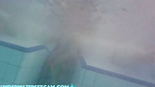 This Young Couple Plays Together Underwater In Front Of Many People