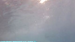 This Young Couple Plays Together Underwater In Front Of Many People