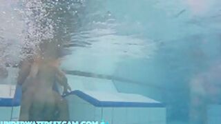 This Young Couple Plays Together Underwater In Front Of Many People