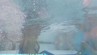 This Young Couple Plays Together Underwater In Front Of Many People