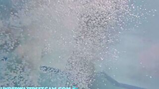 This Young Couple Plays Together Underwater In Front Of Many People