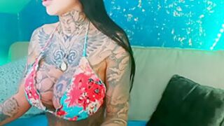 Busty Tattoo Bimbo Plays With Pussy