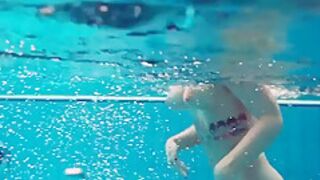 Hot Tatted Babe Dashka Has Big Tits Swirling Underwater