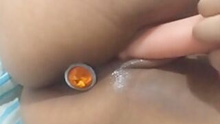 Young Girl Masturbating With Anal Plug In Her Ass