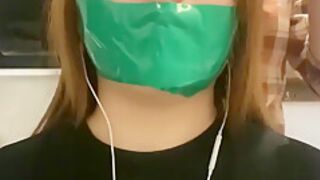 Girl Duct Tape Gagged