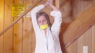 Cute Girl Yellow Tape Gagged