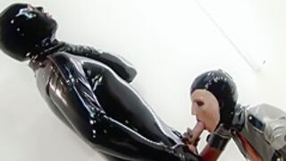 Latex Femdom Sitting On A Slaves Face